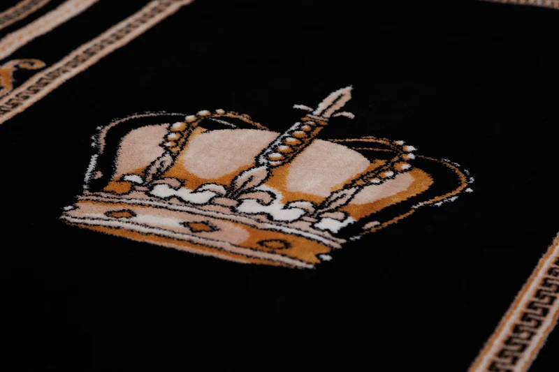 Wohnzimmerteppich in Schwarz Gold mit edlem Kronenmotiv im Italienischen Design - rutschfest & langlebig