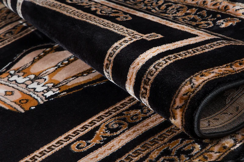 Wohnzimmerteppich in Schwarz Gold mit edlem Kronenmotiv im Italienischen Design - rutschfest & langlebig