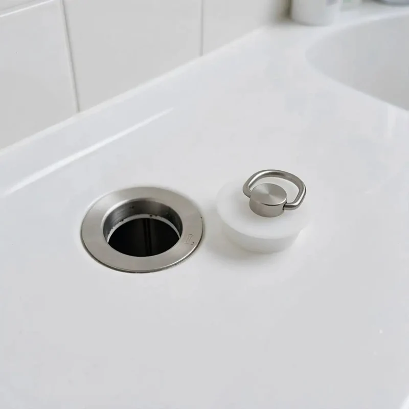 Universal White Silicone Bathtub Drain Stopper with Stainless Steel Ring Fits like a Glove on all Standard Sinks Heavy Duty Leak Proof Plugs Keeps Your Bathroom Spotless and no more Draining Issues