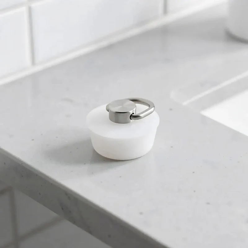 White Silicone Drain Plug With Flexible Ring For Bathtubs And Sinks Minimalist Bathroom Essential Quick Slide Press Down Operation Zero Fuss Installation Grips Firmly To Hold Water Shut Runs Smooth For Everyday Use