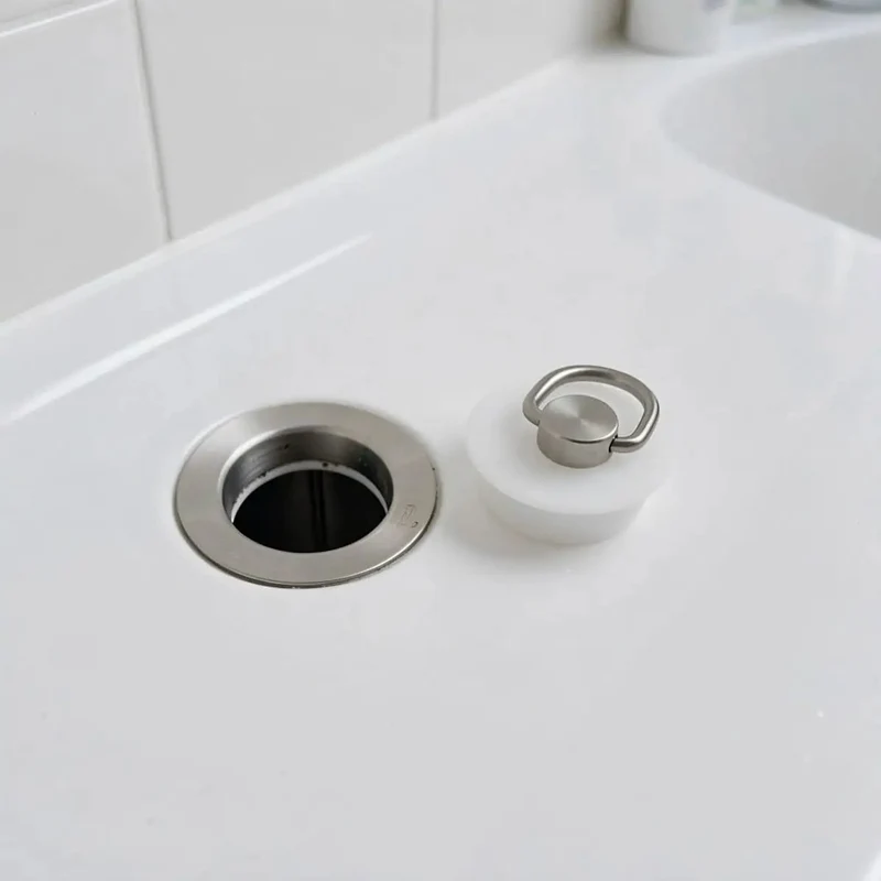Heavy Duty Silicone Drain Stopper For Kitchen Sinks And Bathtubs With Quick Release Hanging Ring, White, Blocks Stuck Hair Clogs Fast, Easy Yank Clean, Solid Water Seal Shield, Nonslip Base, Big Time Bathroom Tool You Can Depend On