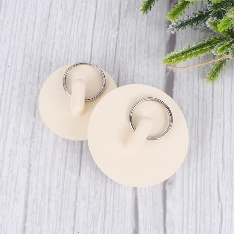 4 Pack Rubber Drain Stopper With Hang Tab Works Like a Charm For Bathtub And Sink Holds Tight No Slipping To Stop Hair And Debris While Keeping Your Bath Or Kitchen Sink Clear And Fresh Making Home Maintenance a Breeze For a Relaxing Daily Grind