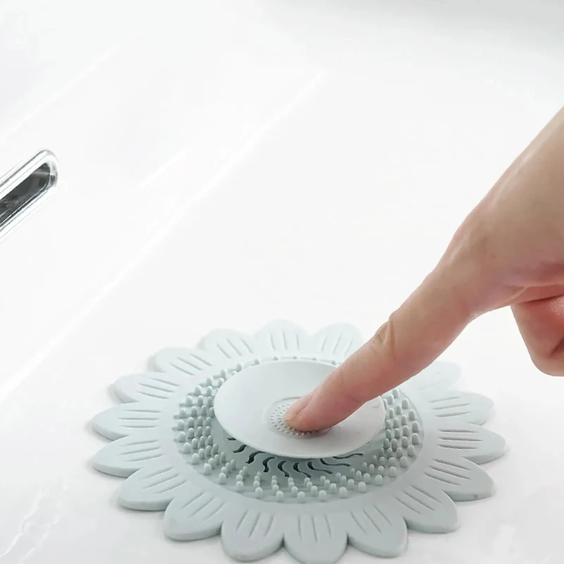 White Flower Silicone Drain Plug Snaps Right On To Bust Pipe Clogs And Trap Stray Hairs While Locking Water Tight For Fussless Sink Or Tub Maintenance That Really Delivers