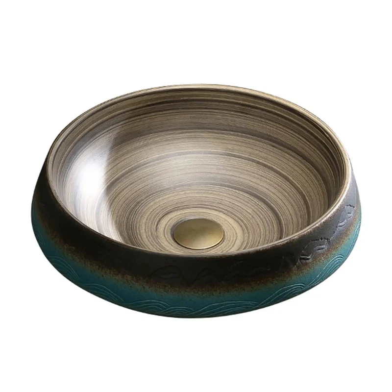 Vintage Ceramic Vessel Sink With Hand Carved Details And Unique Inner Swirl Lines Round Skirted Basin Showstopper Piece With Under Cabinet Option For High End Bathrooms Adding Classy Charm To Your Digs