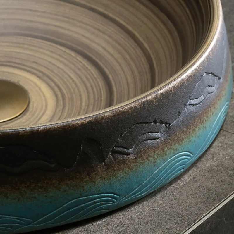 Vintage Ceramic Vessel Sink With Hand Carved Details And Unique Inner Swirl Lines Round Skirted Basin Showstopper Piece With Under Cabinet Option For High End Bathrooms Adding Classy Charm To Your Digs