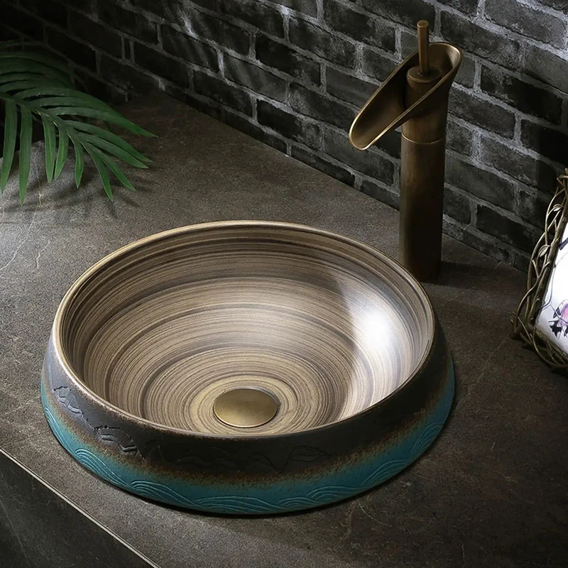 Vintage Ceramic Vessel Sink With Hand Carved Details And Unique Inner Swirl Lines Round Skirted Basin Showstopper Piece With Under Cabinet Option For High End Bathrooms Adding Classy Charm To Your Digs