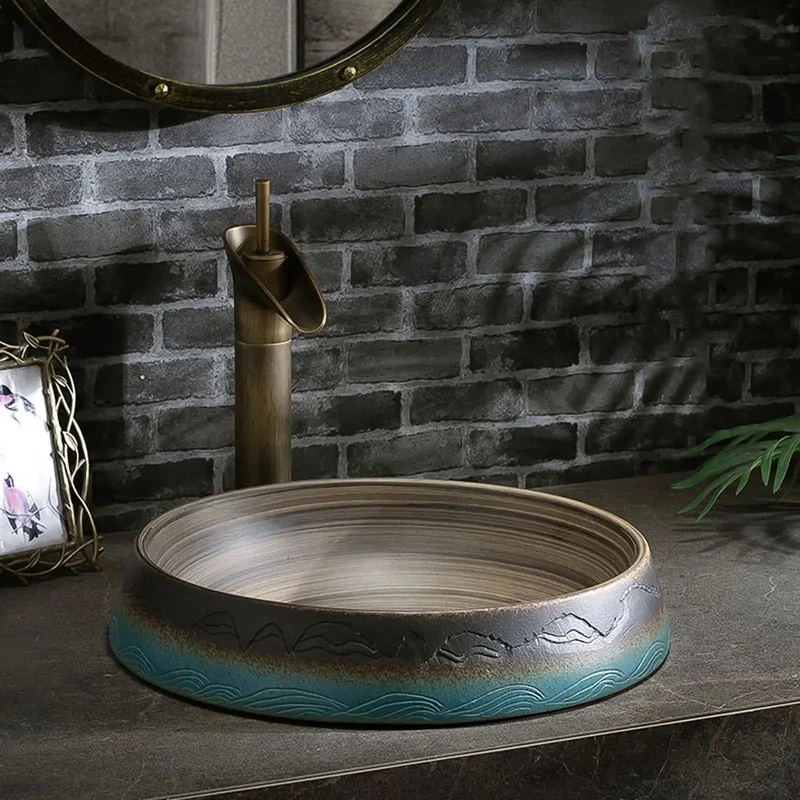 Vintage Ceramic Vessel Sink With Hand Carved Details And Unique Inner Swirl Lines Round Skirted Basin Showstopper Piece With Under Cabinet Option For High End Bathrooms Adding Classy Charm To Your Digs