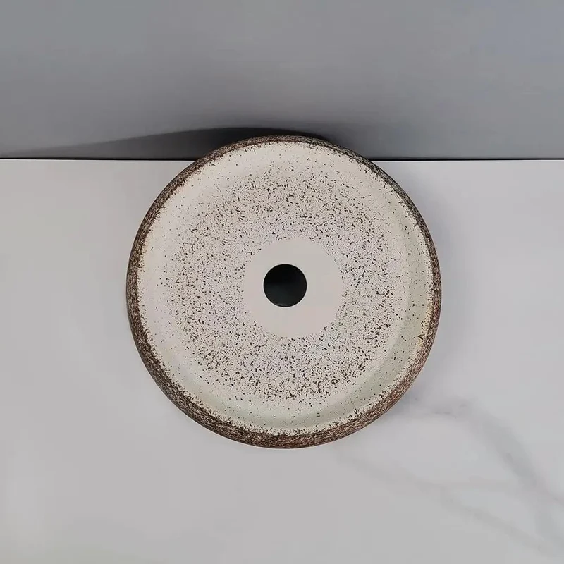Round Countertop Vessel Sink Made From Premium Ceramic With A Slick Smooth Finish And Classy Artistic Curve Design Perfect For Adding A Touch Of Elegant Luxury To Your Bathroom Or Hotel Style Vanity Setup That Really Turns Heads And Keeps It Real Simple.