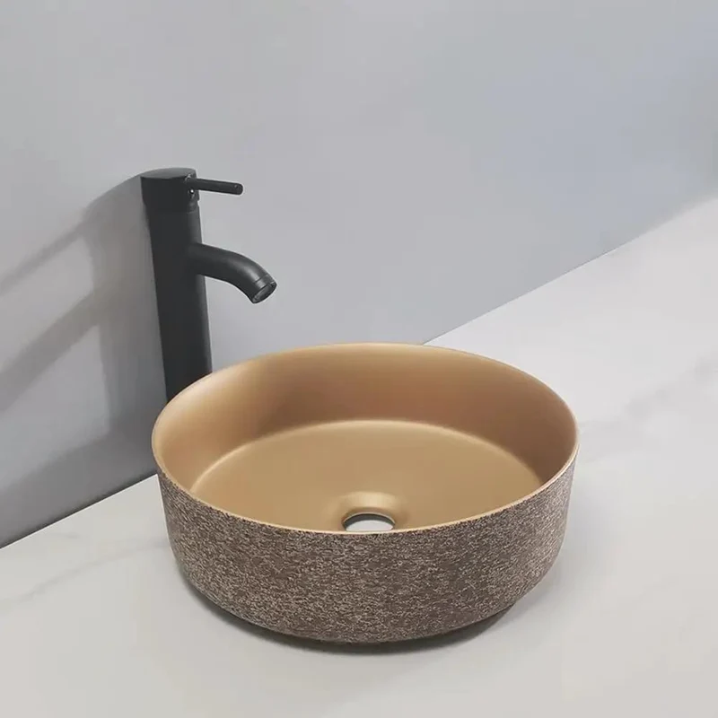 Round Countertop Vessel Sink Made From Premium Ceramic With A Slick Smooth Finish And Classy Artistic Curve Design Perfect For Adding A Touch Of Elegant Luxury To Your Bathroom Or Hotel Style Vanity Setup That Really Turns Heads And Keeps It Real Simple.