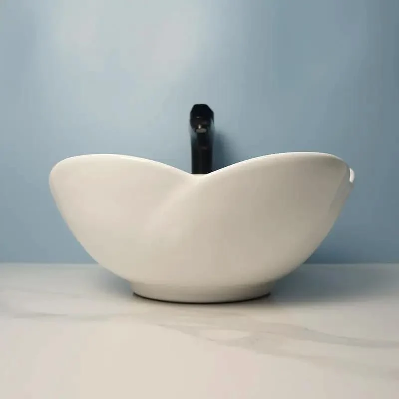 Top Tier Ceramic Vessel Sink For Bathroom Counter Straight Up Sleek White Wash Basin With Smooth As Glass Finish Hassle Free Cleaning And Low Key Stunning Petal Shape For Effortless Daily Use