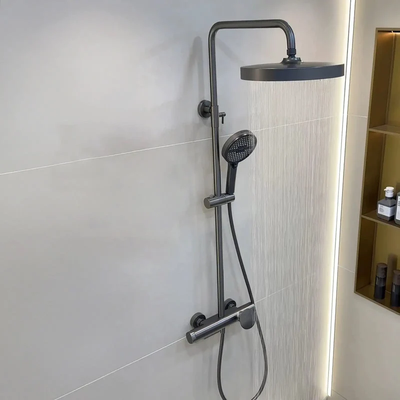 Straight Up Premium Exposed Wall Mount Shower System In Gun Gray Packs A Massive 280mm Round Rainfall Head And Four Pattern Handheld Sprayer Joined By A Clean Waterfall Tub Spout For A Bathroom Refresh That Truly Slaps