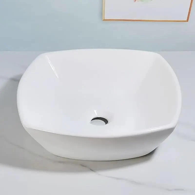 Sleek Square Ceramic Vessel Sink for Your Oasis. Modern Countertop Wash Basin with High Gloss Finish. Easy Wipe Clean Design That Slays and Never Yellows. Hotel Grade Quality for a Bougie Vibe. Durable Stain Resistant Sink.