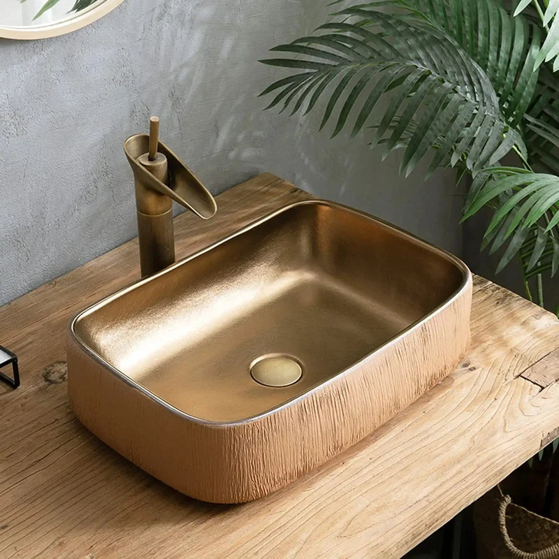 Heavy Hitter Gold Ceramic Vessel Bathroom Sink Rectangular Countertop Washbasin Featuring Hand Carved Texture And Retro Industrial Charm For No Sweat Cleaning And Smooth Sailing Flow