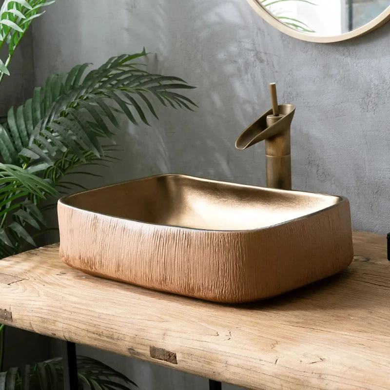 Heavy Hitter Gold Ceramic Vessel Bathroom Sink Rectangular Countertop Washbasin Featuring Hand Carved Texture And Retro Industrial Charm For No Sweat Cleaning And Smooth Sailing Flow