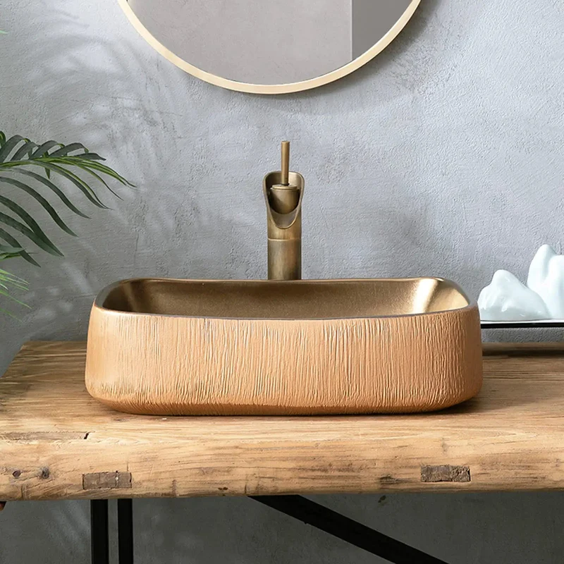 Heavy Hitter Gold Ceramic Vessel Bathroom Sink Rectangular Countertop Washbasin Featuring Hand Carved Texture And Retro Industrial Charm For No Sweat Cleaning And Smooth Sailing Flow