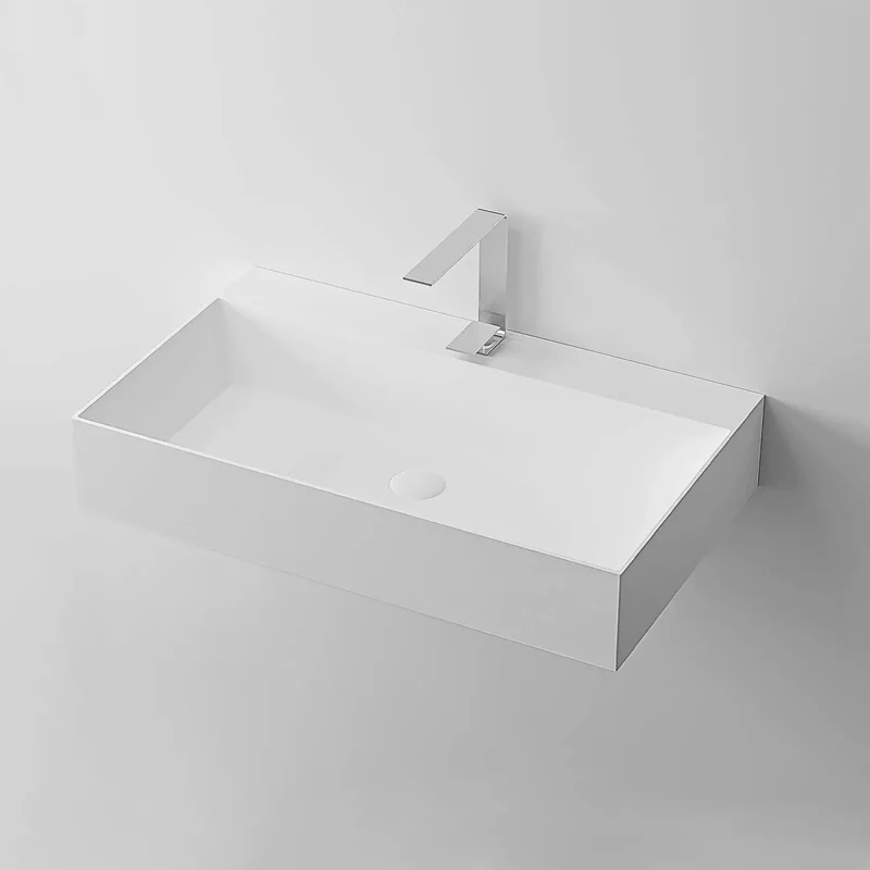 Slick Wall Mounted Bathroom Vessel Sink In Matte White Solid Surface Creates A Roomy 36 By 18 Inch Rectangular Trough Layout That Clears Floor Space And Gives Your Powder Room A Straightforward Modern Edge