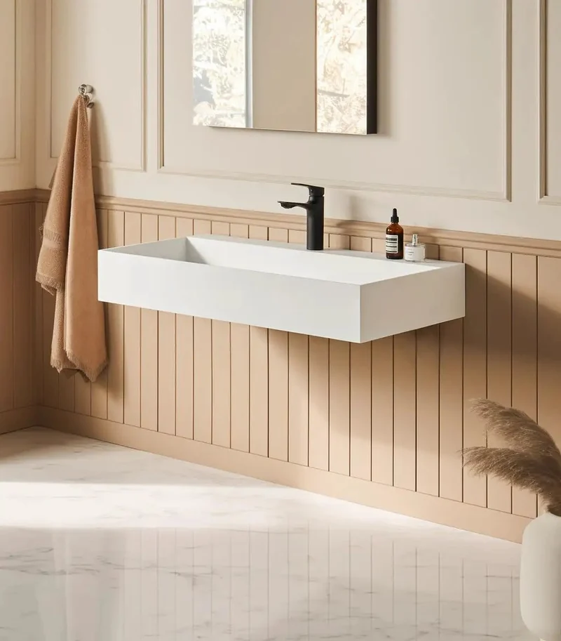 Slick Wall Mounted Bathroom Vessel Sink In Matte White Solid Surface Creates A Roomy 36 By 18 Inch Rectangular Trough Layout That Clears Floor Space And Gives Your Powder Room A Straightforward Modern Edge
