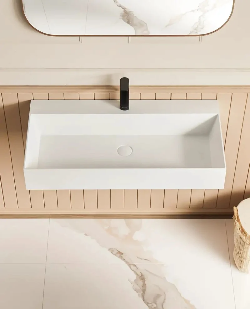 Slick Wall Mounted Bathroom Vessel Sink In Matte White Solid Surface Creates A Roomy 36 By 18 Inch Rectangular Trough Layout That Clears Floor Space And Gives Your Powder Room A Straightforward Modern Edge