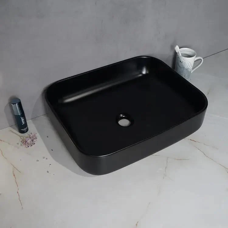 Premium Black Ceramic Vessel Sink For Above Counter Bathroom Vanity Glossy Countertop Wash Basin With Smooth Curves And Hassle Free Install For Modern Hotels Or Upscale Home Fixtures