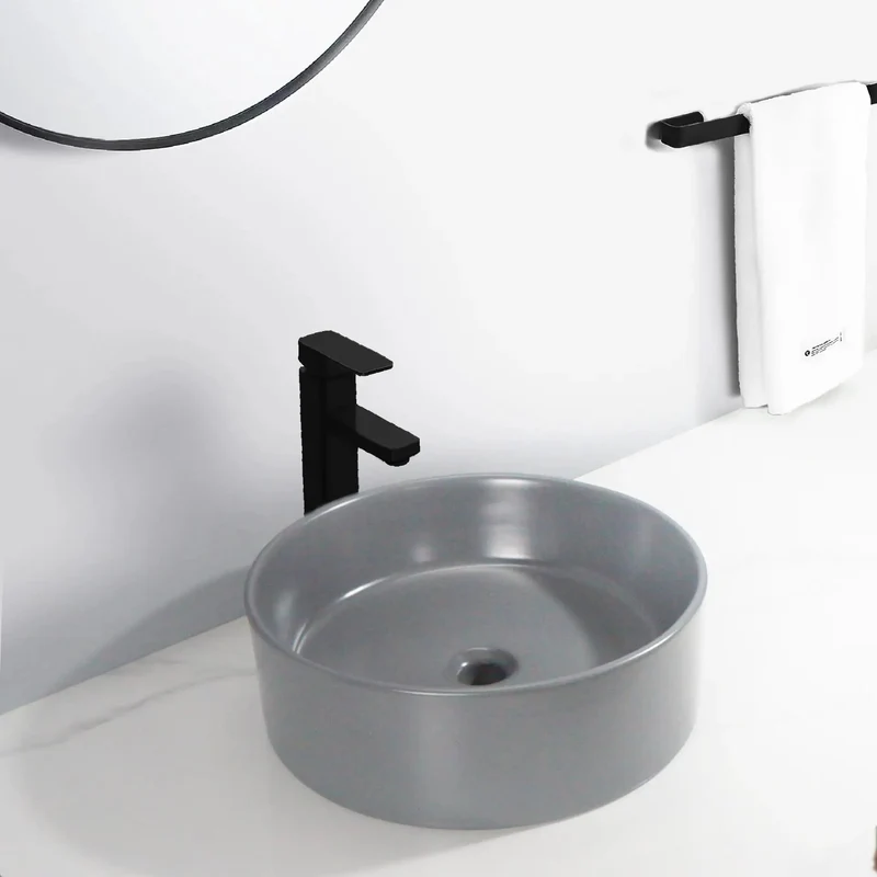 Sleek Round Ceramic Vessel Sink In Matte Gray Finish For A Pretty Sweet Bathroom Glow Up Durable Countertop Basin With Standard Drain Size And Smooth Edge Design