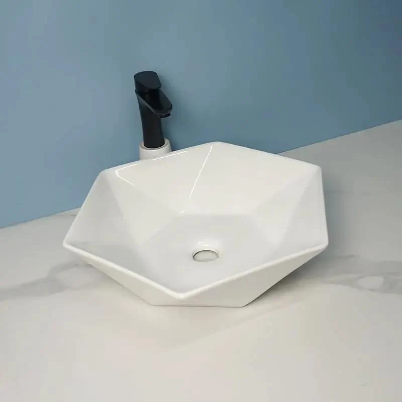Premium Anti Scratch Glaze Surface Mounted Hexagonal Ceramic Vessel Sink Straight Up Slick Artistic Wash Basin For Modern Bathroom Vanity Sink For Hotels And Spas