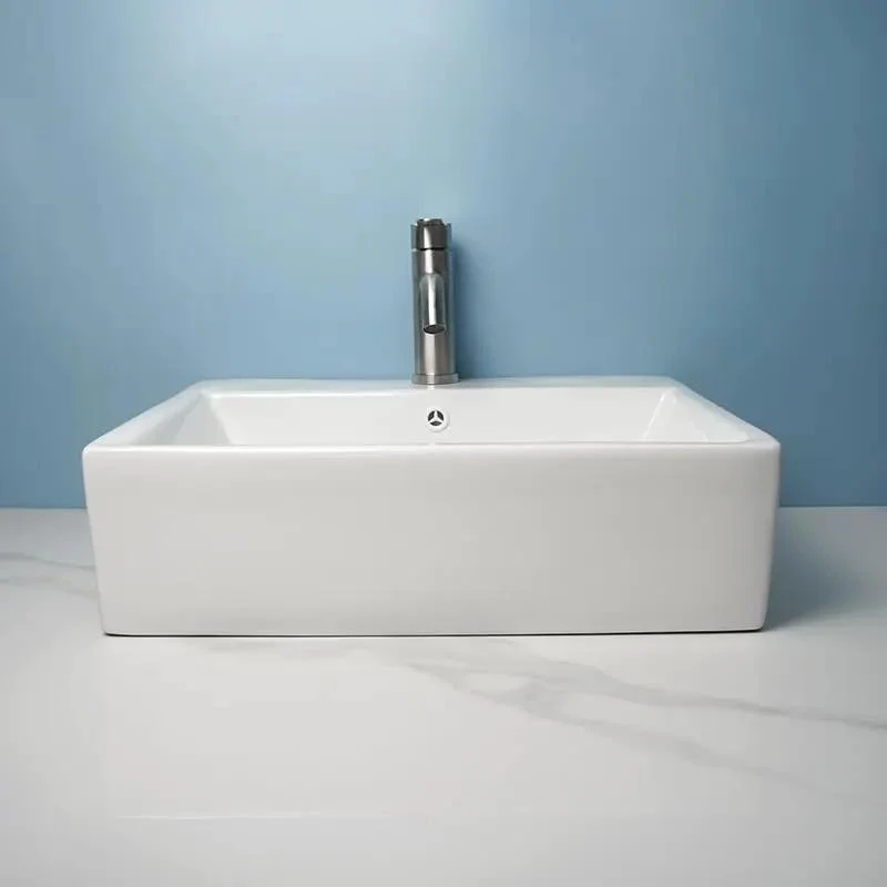 Slick Ceramic Vessel Sink Bathroom Washbasin Above Ground Wall Mount Basin With Sharp Modern Luxury Lines Smooth Glaze Finish Effortless Install Top Shelf Durable Contemporary Fixtures