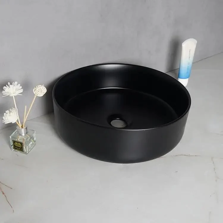 Top Tier Round Ceramic Vessel Sink In Dope Matte Black Finish Above Counter Wash Basin With Hella Strong Build For Modern Bathrooms And Fresh Lounge Areas