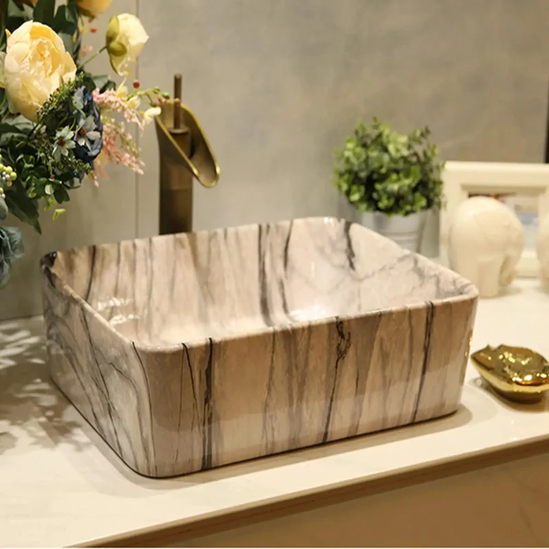 Professional Grade Rectangular Ceramic Vessel Sink With Slick Marble Veining And Complete Faucet Kit Hassle Free Countertop Setup For Show Stopping Bathroom Vanity