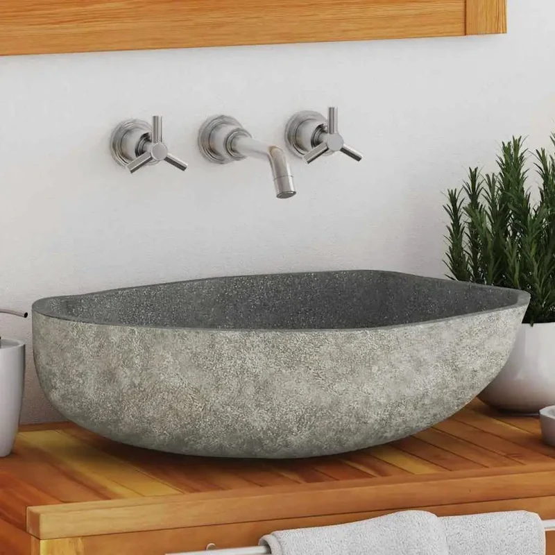 Rock Solid Handcrafted River Stone Oval Countertop Vessel Sink For Modern Bathrooms Featuring A Slick Polished Interior That Wipes Clean In A Jiffy And Delivers Serious Durability For Daily Use