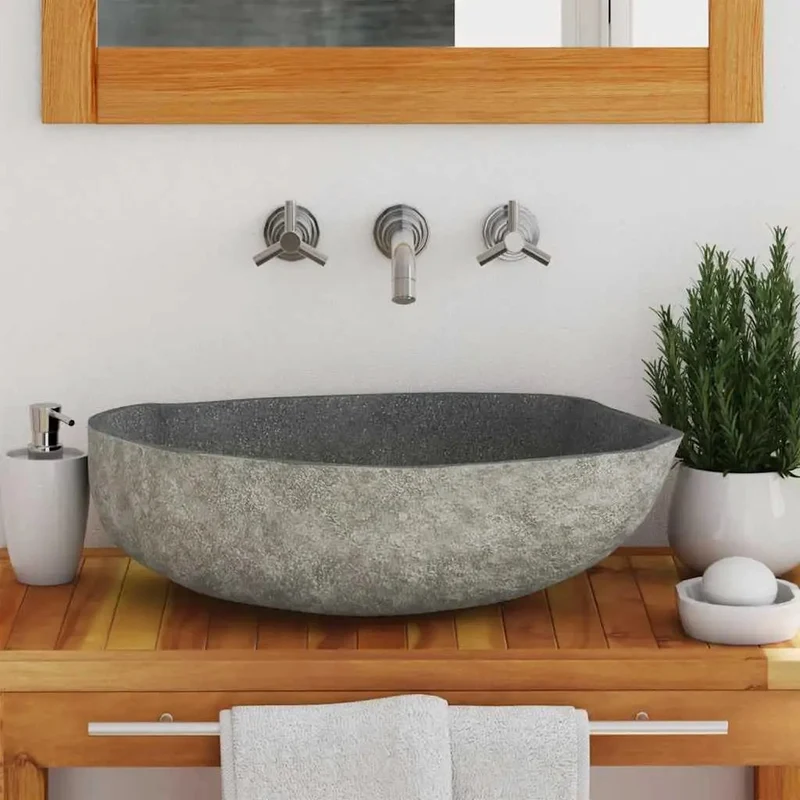 Rock Solid Handcrafted River Stone Oval Countertop Vessel Sink For Modern Bathrooms Featuring A Slick Polished Interior That Wipes Clean In A Jiffy And Delivers Serious Durability For Daily Use