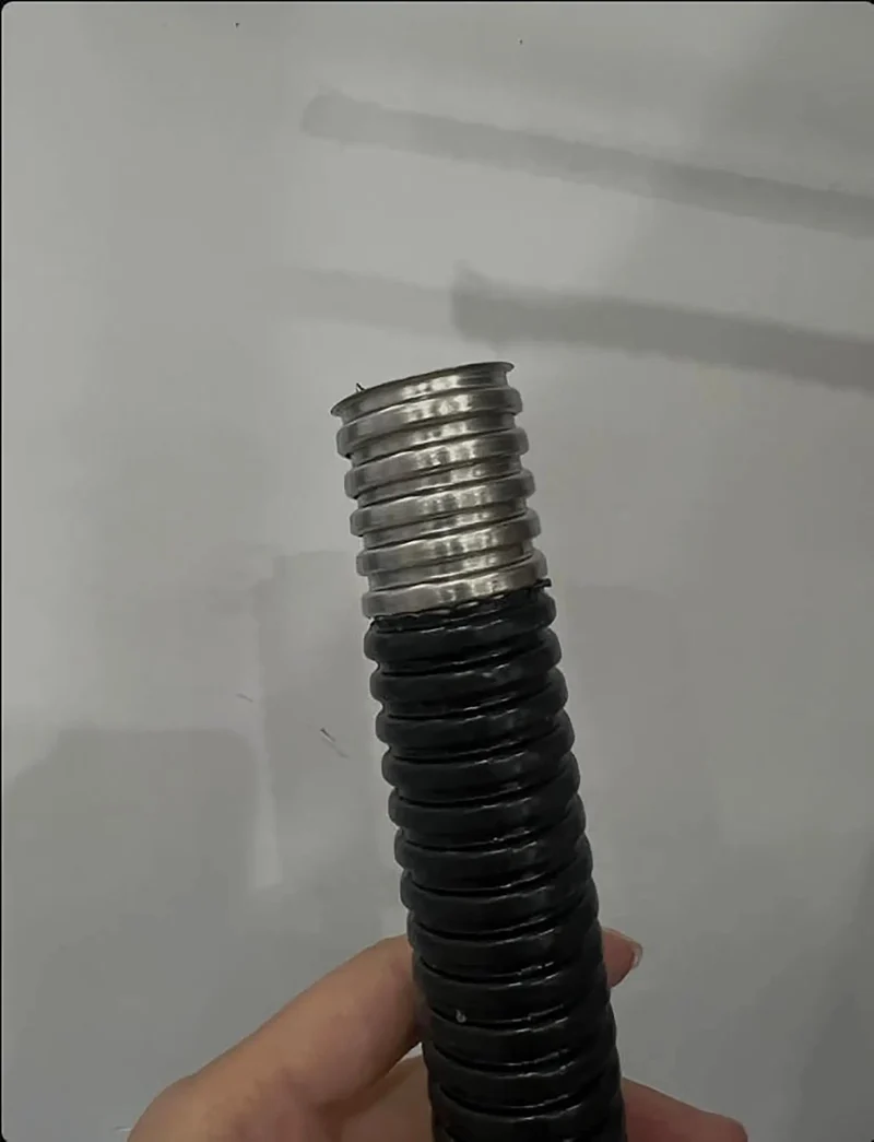 Heavy Duty Flexible Metal Conduit With Black PVC Coating Corrugated Wire Protection Tube For Railway And Industrial Electrical Projects Tough As Nails Cable Management Roll That Lasts Forever